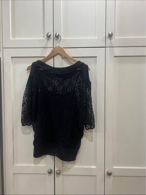 Lace top with cut out shoulders with built in tank top